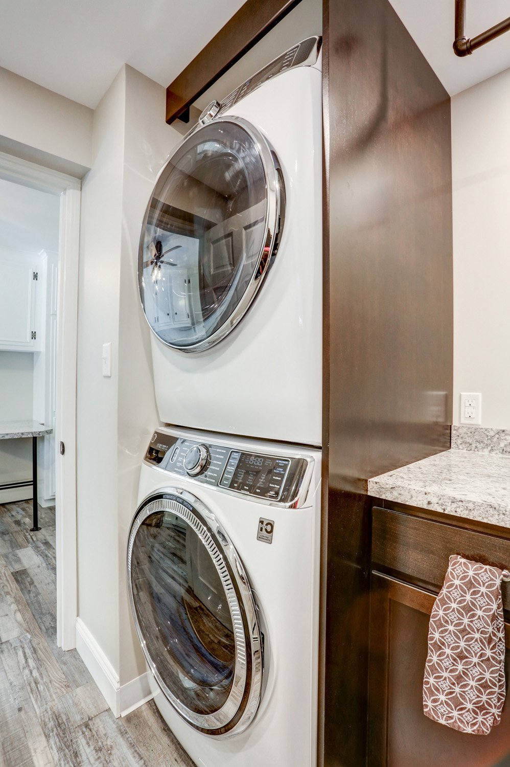 Lancaster Laundry Room Remodel with staked washer and dryer