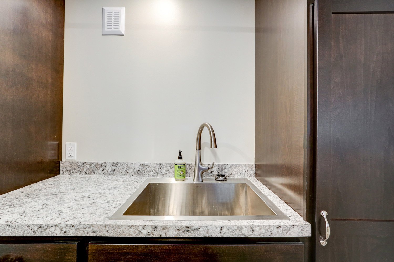 Sink with Laminate Countertop in Lancaster Laundry Room Remodel