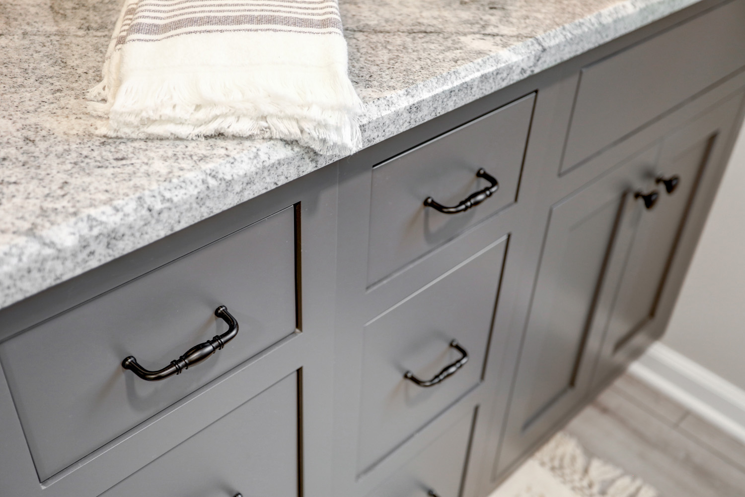 Dark gray vanity with matte black hardware in Manheim Township Bathroom