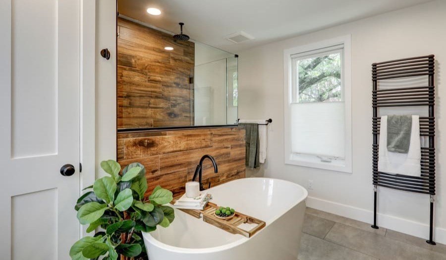 Bathroom remodel with wood tile and freestanding tub