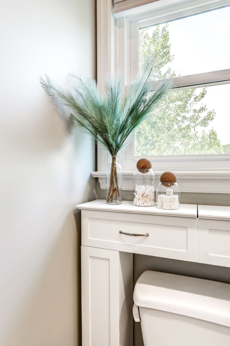 Lititz kids bathroom remodel with over toilet storage