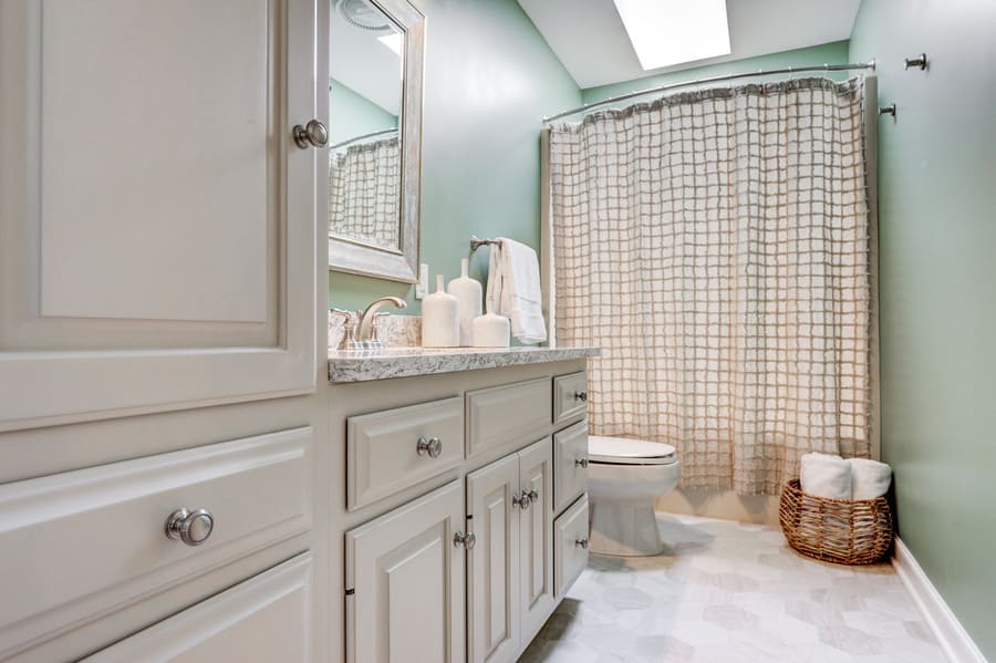 Centerville Kids Bathroom Refresh with new white cabinets