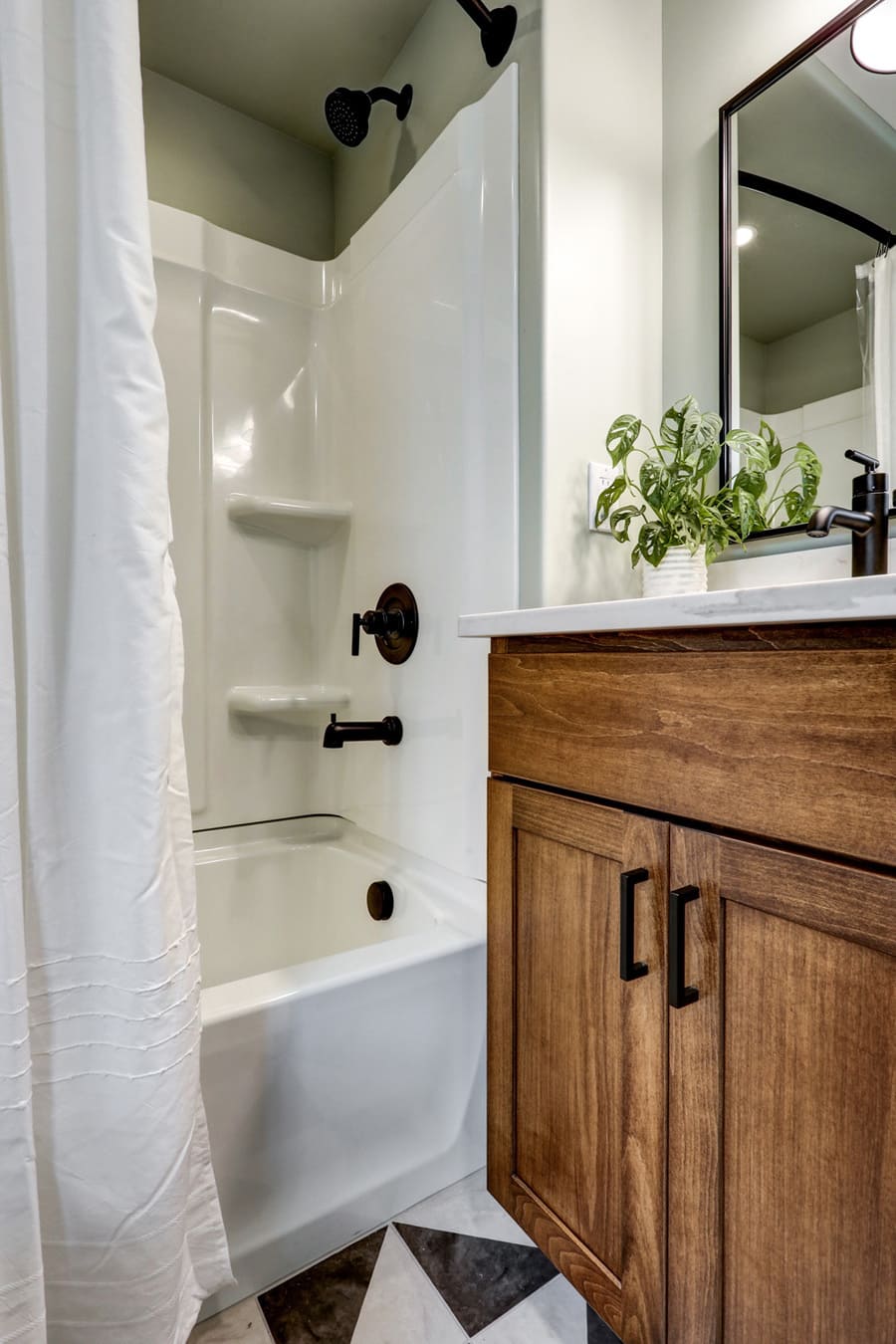 wood vanity with oil rubbed bronze hardware in Elizabethtown bathroom remodel