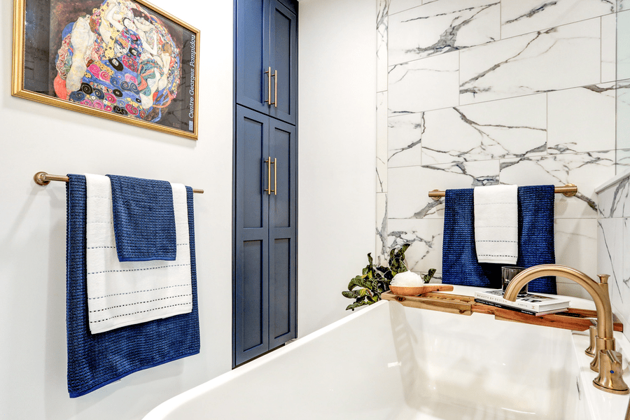 Linen cabinet and freestanding tub in Hempfield Master Bathroom Remodel 