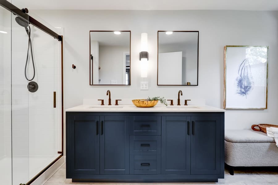 Manheim Township Primary Bathroom Remodel with blue vanity cabinets