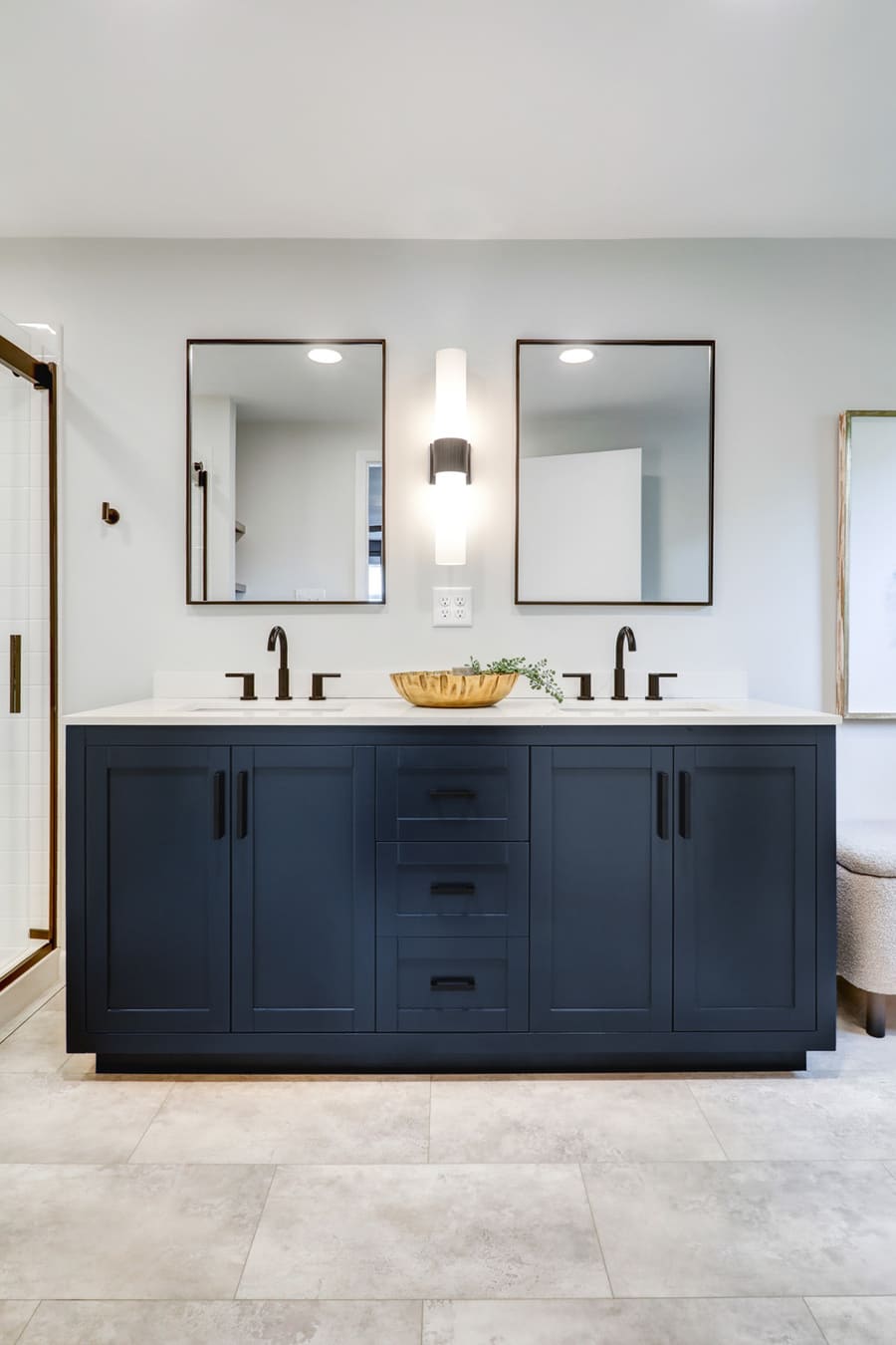 Manheim Township Primary Bathroom Remodel with blue vanity and matte black accents