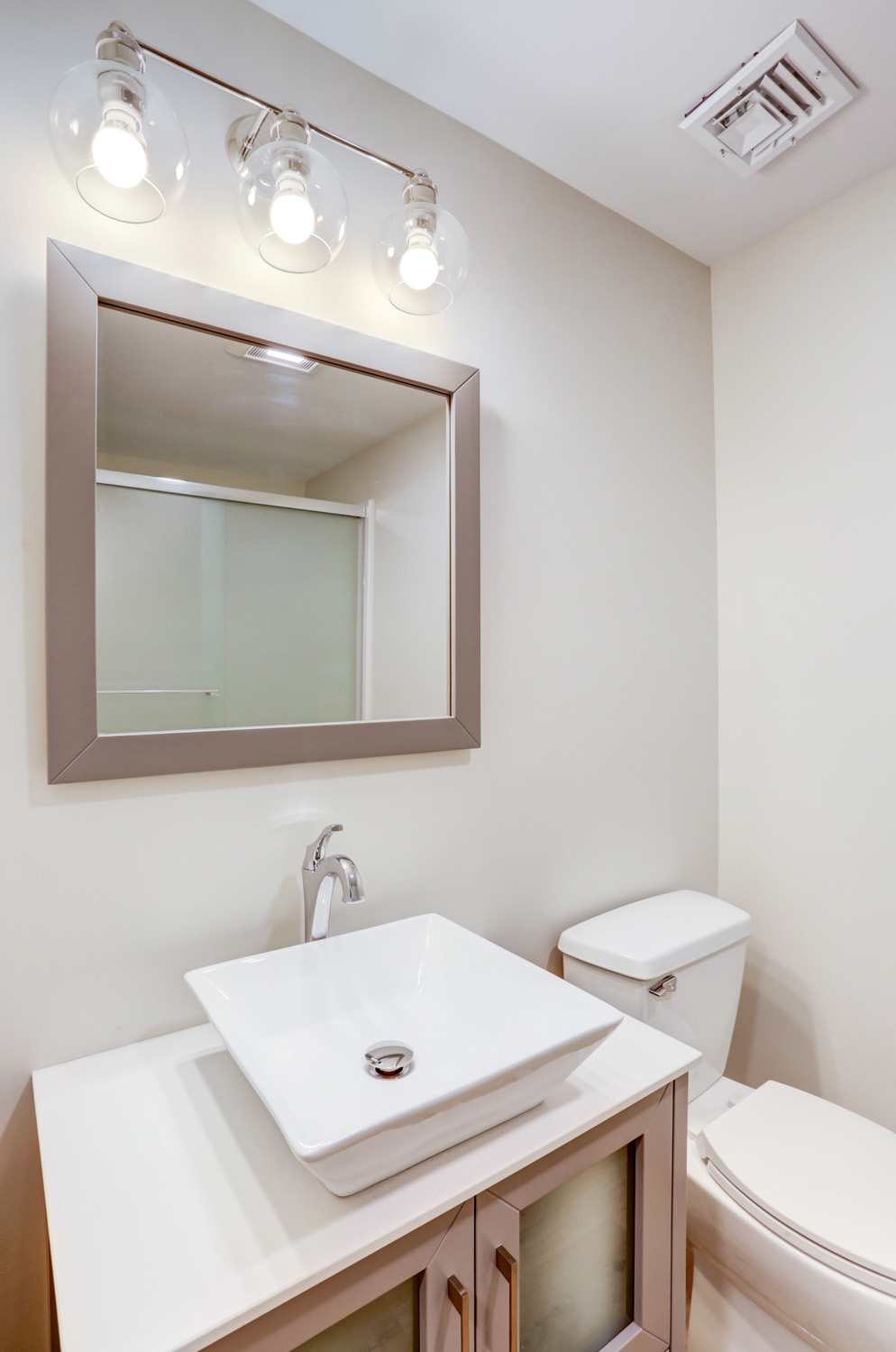 Lampeter Basement Bathroom Remodel with vessel sink and new lighting