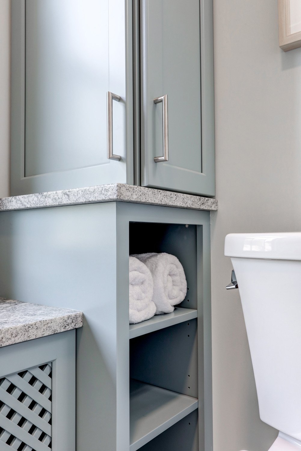 Blue open shelves in Lancaster Bathroom Remodel