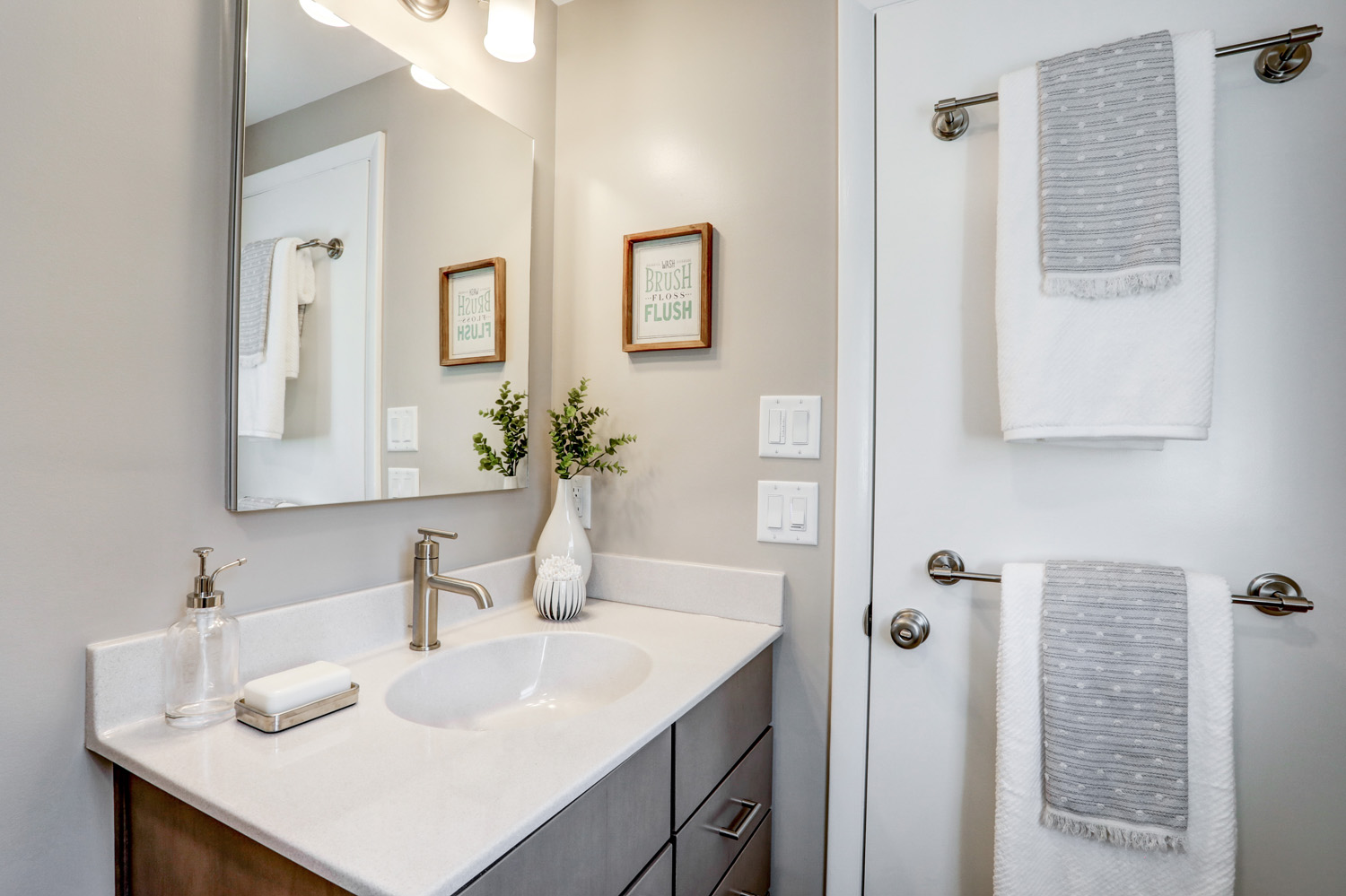 Manheim Township Bathroom Remodel with white vanity top and brushed nickel accessories