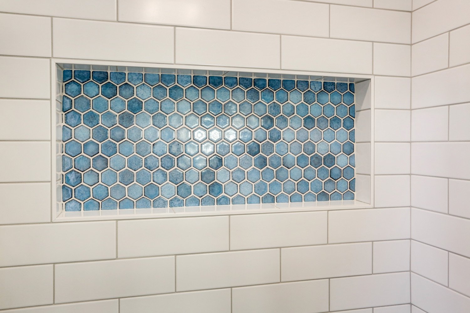 Blue Hexagon tile in built in shower shelf in Master Bathroom Remodel in Lancaster 