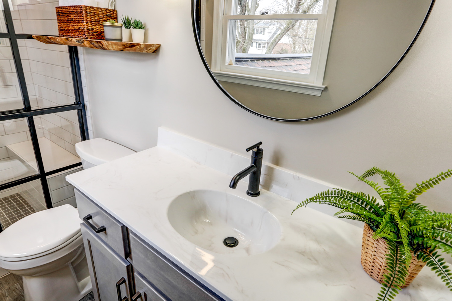 Marble Vanity Top with Matte Black Faucet in Master Bathroom Remodel in Lancaster 