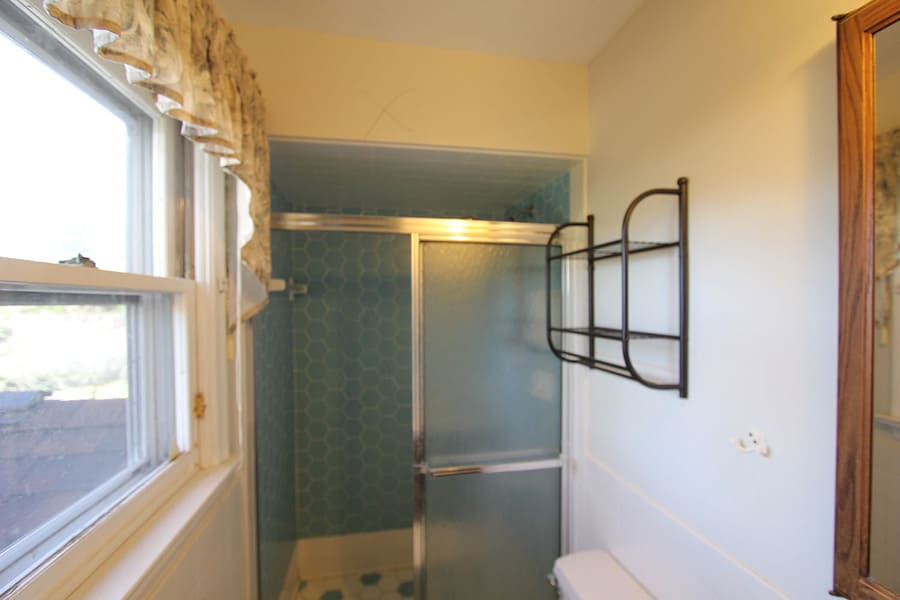 Before photo of shower in Lancaster master bathroom remodel