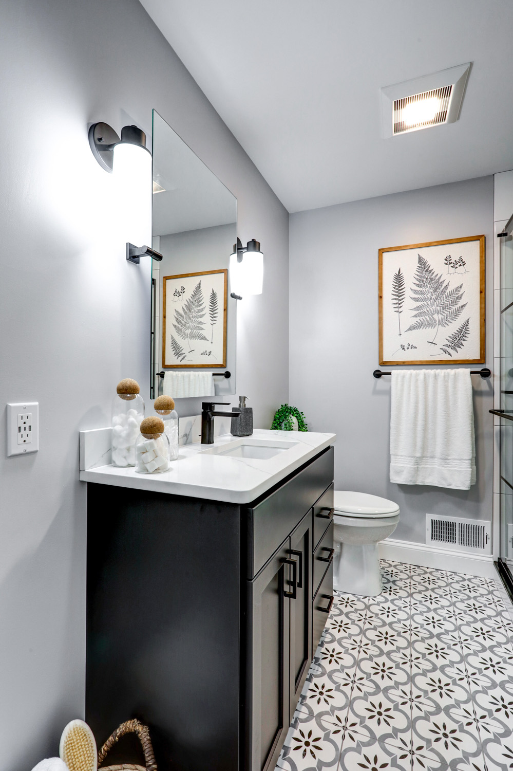 Lancaster City Guest Bathroom with black vanity