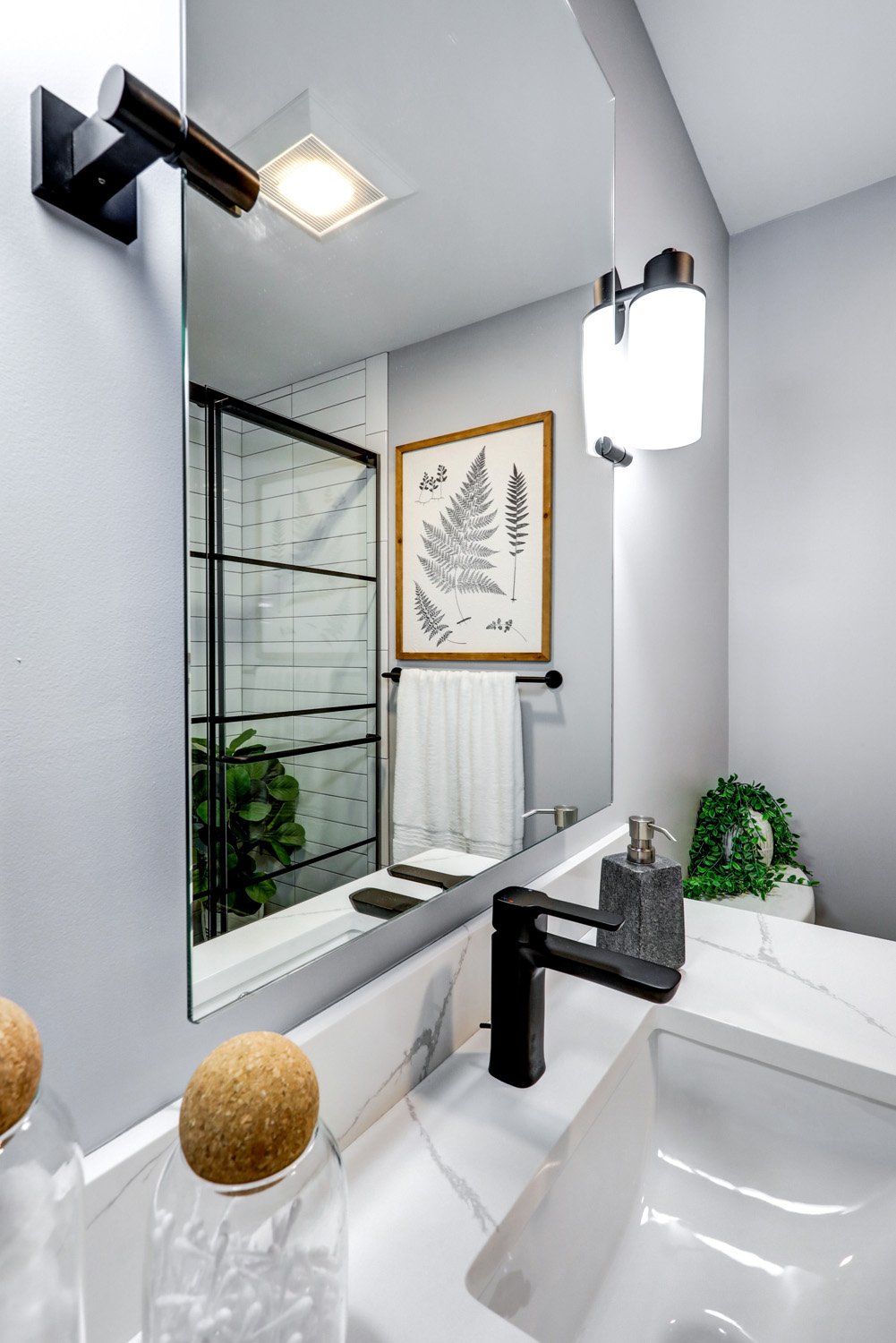 Lancaster City Guest Bathroom with sleek mirror