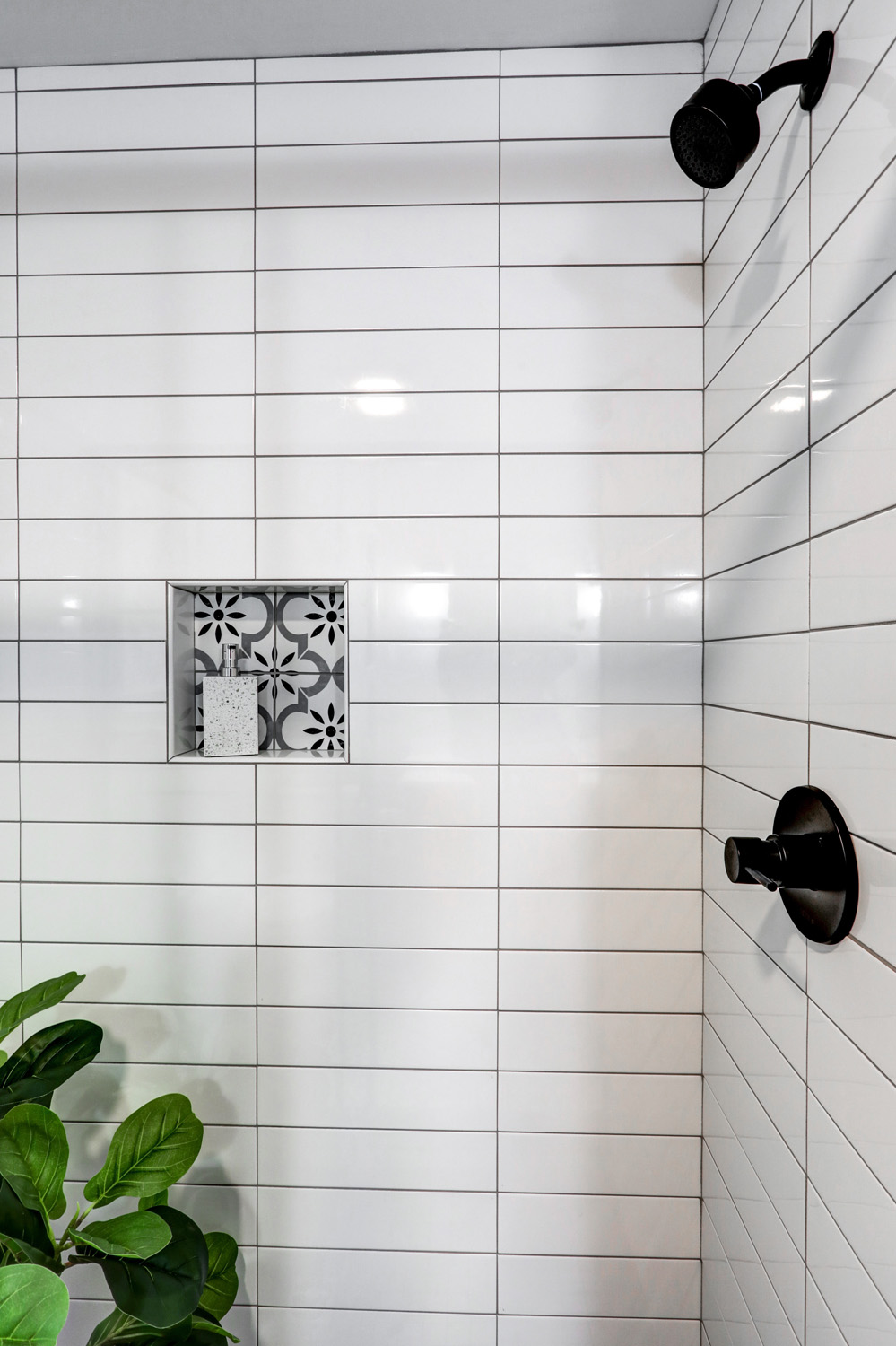shower niche and matte black showerhead in Lancaster City Guest Bathroom