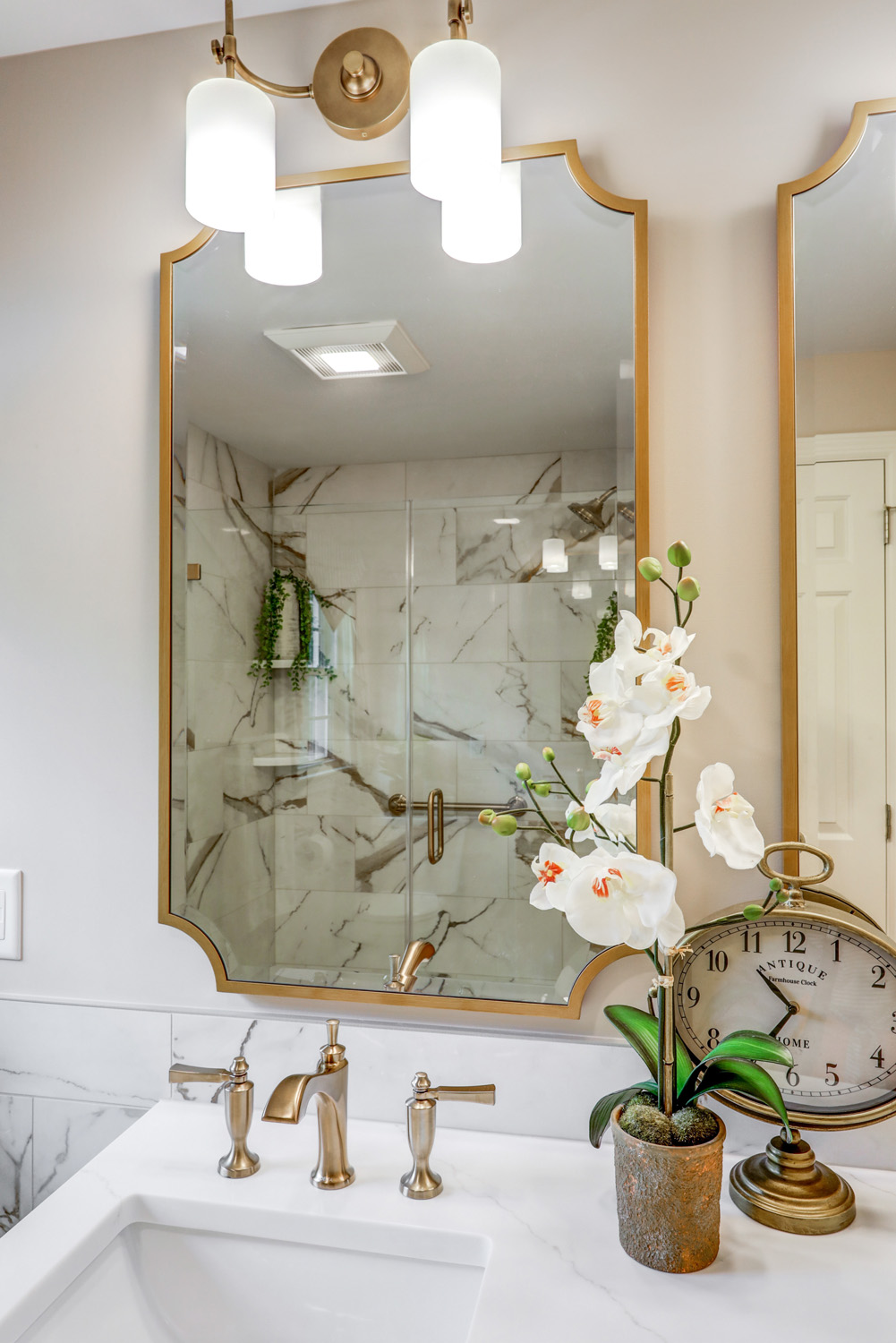 Champagne bronze mirror and faucet in Manheim Township Master Bathroom Remodel