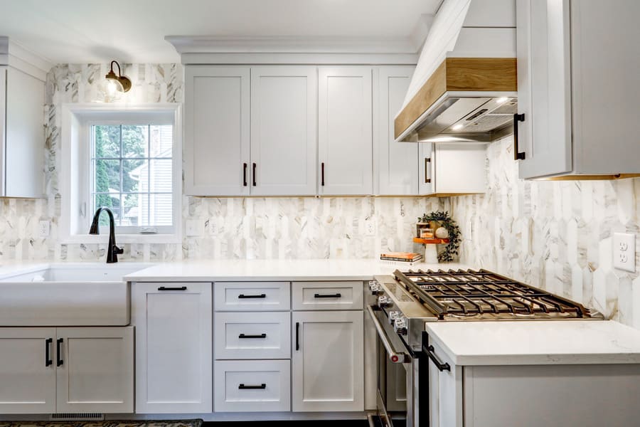 white cabinets and custom hood in Lititz kitchen remodel