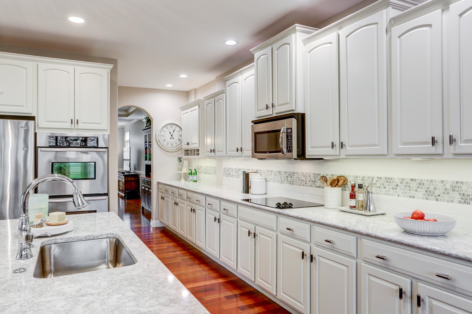 Centerville Kitchen Remodel with white cabinets and stainless steel appliances