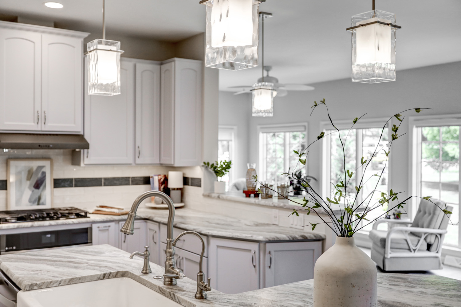 Conestoga Valley Kitchen Remodel with satin nickel faucet and pendant lighting