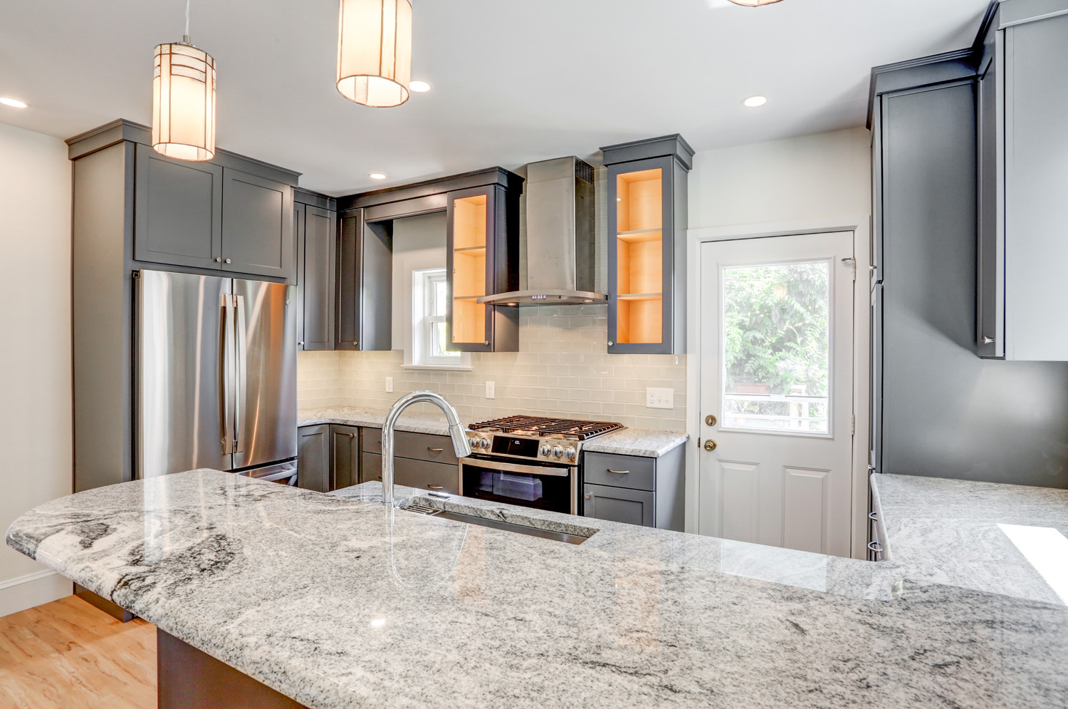 Lancaster City Kitchen Remodel with gray cabinets and stainless steel appliances