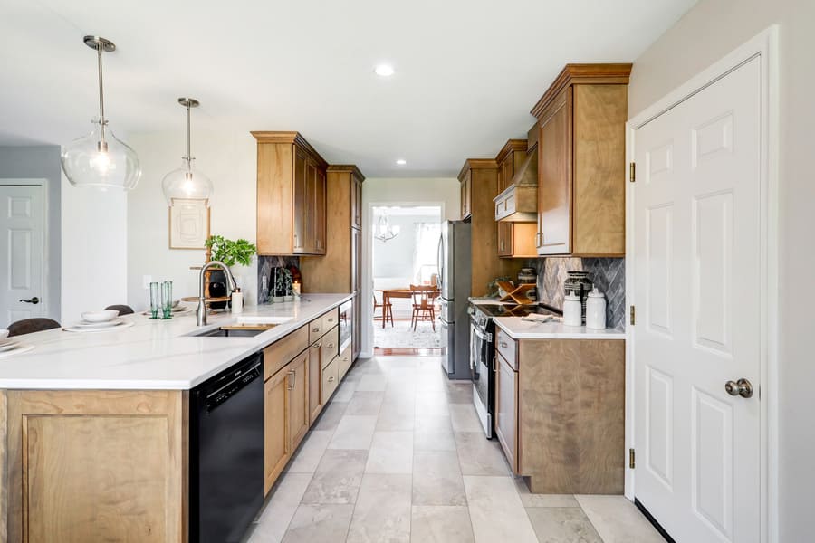 Willow Street Kitchen remodel with light wood cabinets and gray tile floor