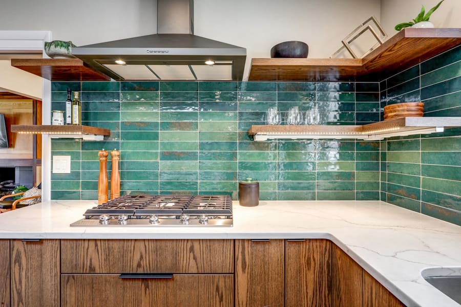 Green tile backsplash in mid-century modern kitchen remodel