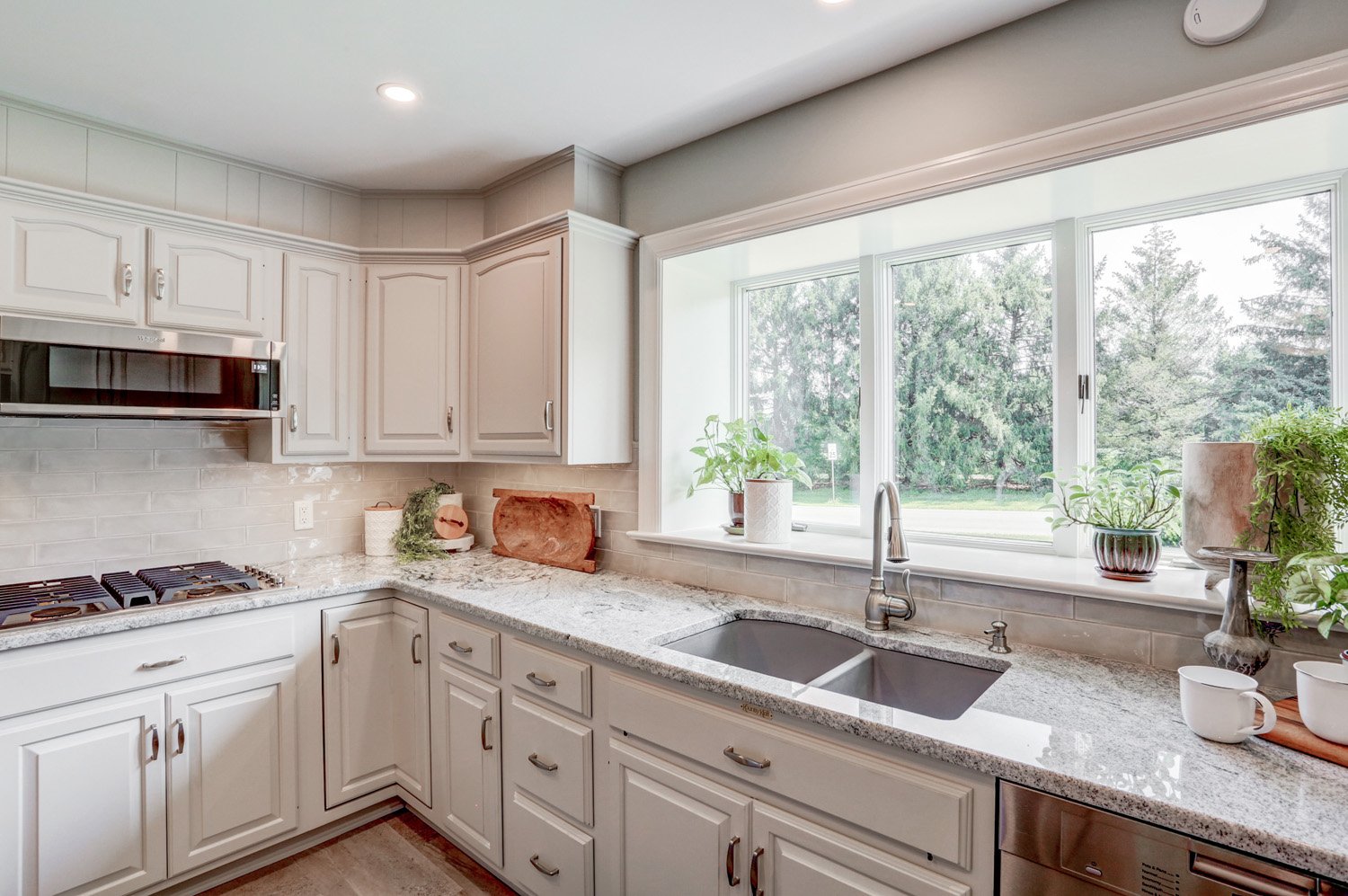 Conestoga Valley Kitchen Remodel with white cabinets and granite