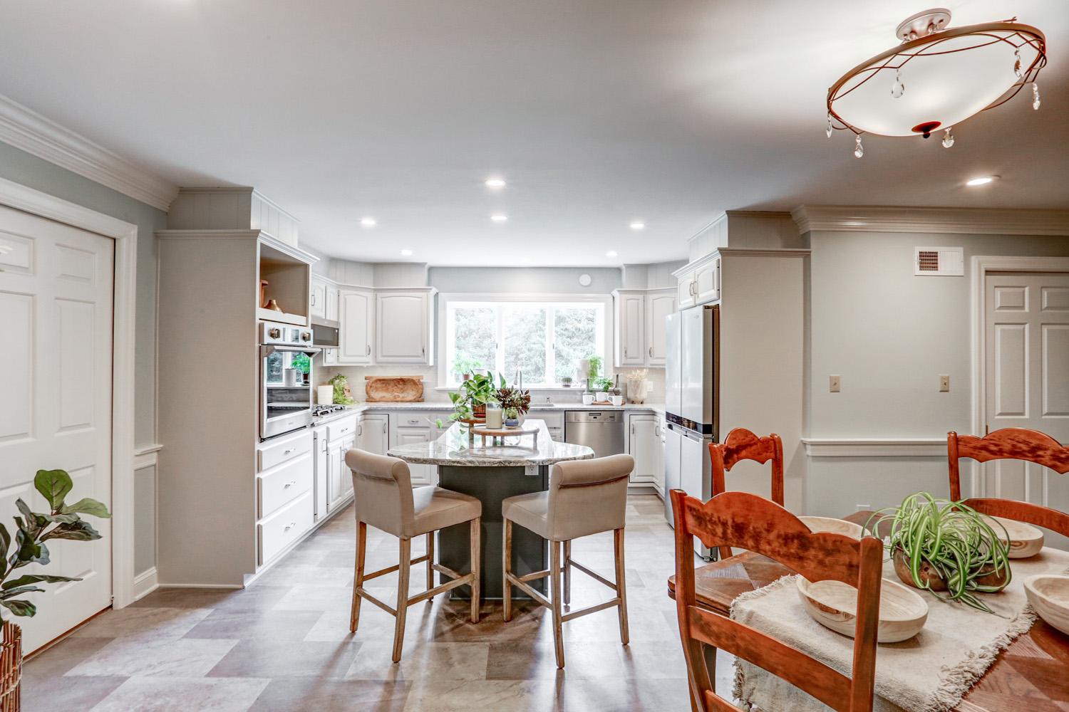 Conestoga Valley Kitchen Remodel with island and white cabinets