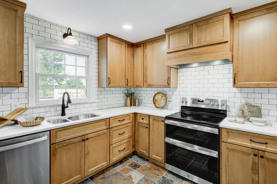 Elizabethtown Kitchen Remodel with light brown cabinets and matte black finishes