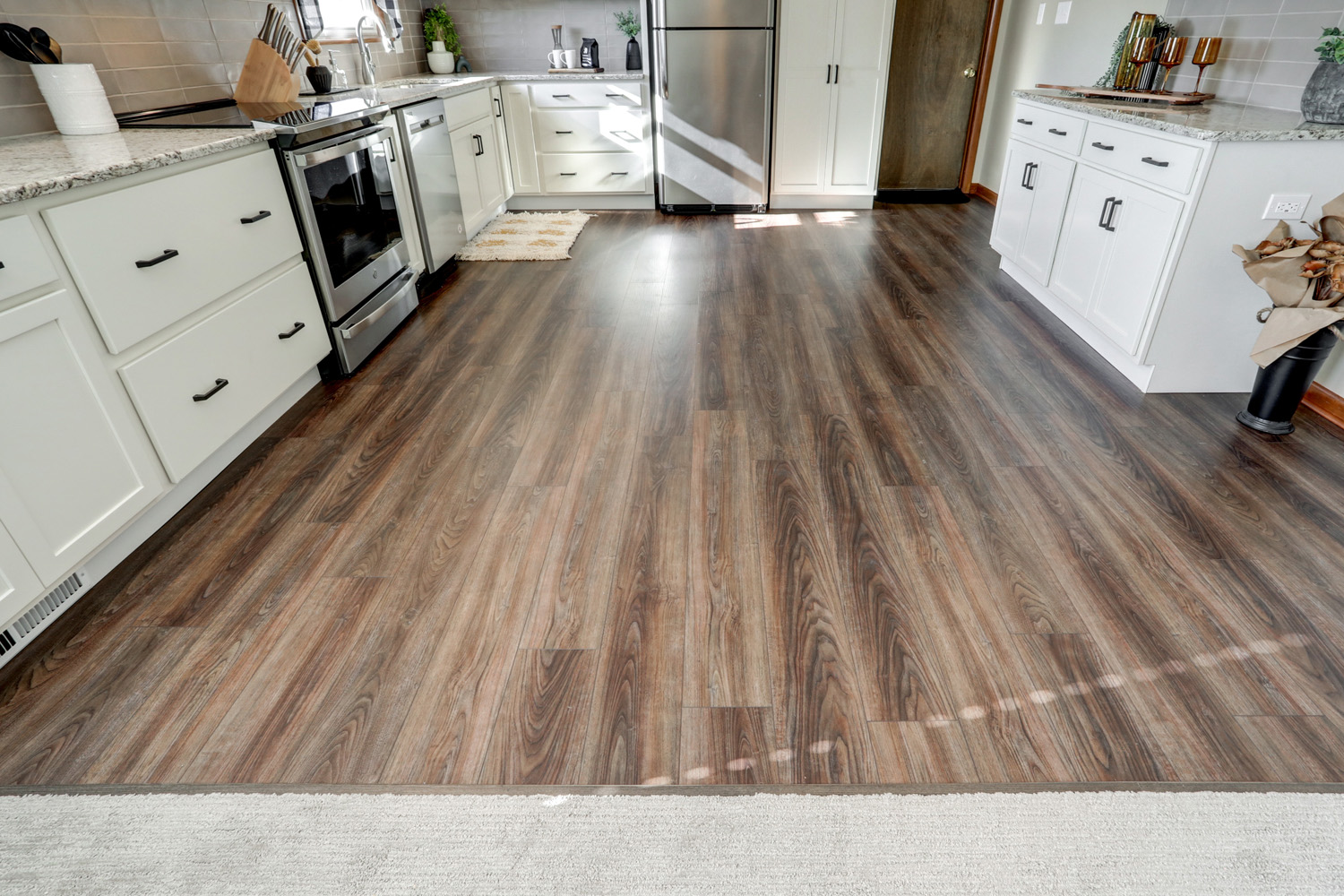 Dark Vinyl Plank Floors in Paradise Kitchen Remodel