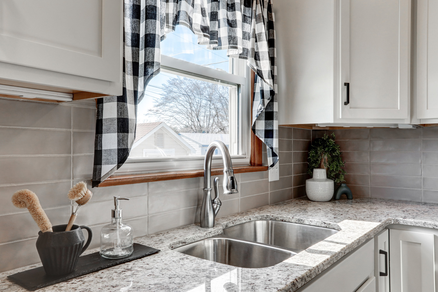 Window above double sink in Paradise Kitchen Remodel