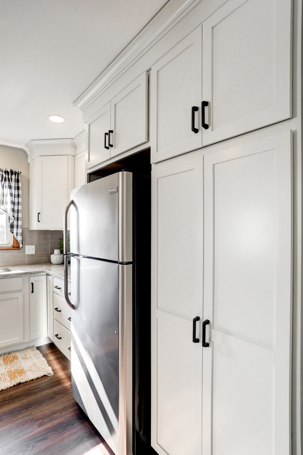 White pantry cabinet in Paradise Kitchen Remodel