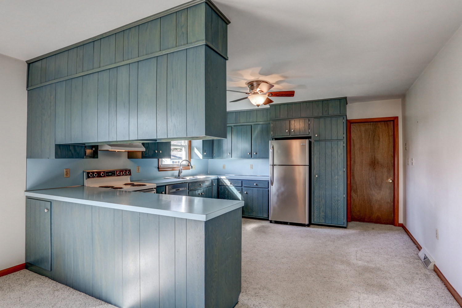 Before photos of kitchen remodel in Lancaster with old blue cabinets