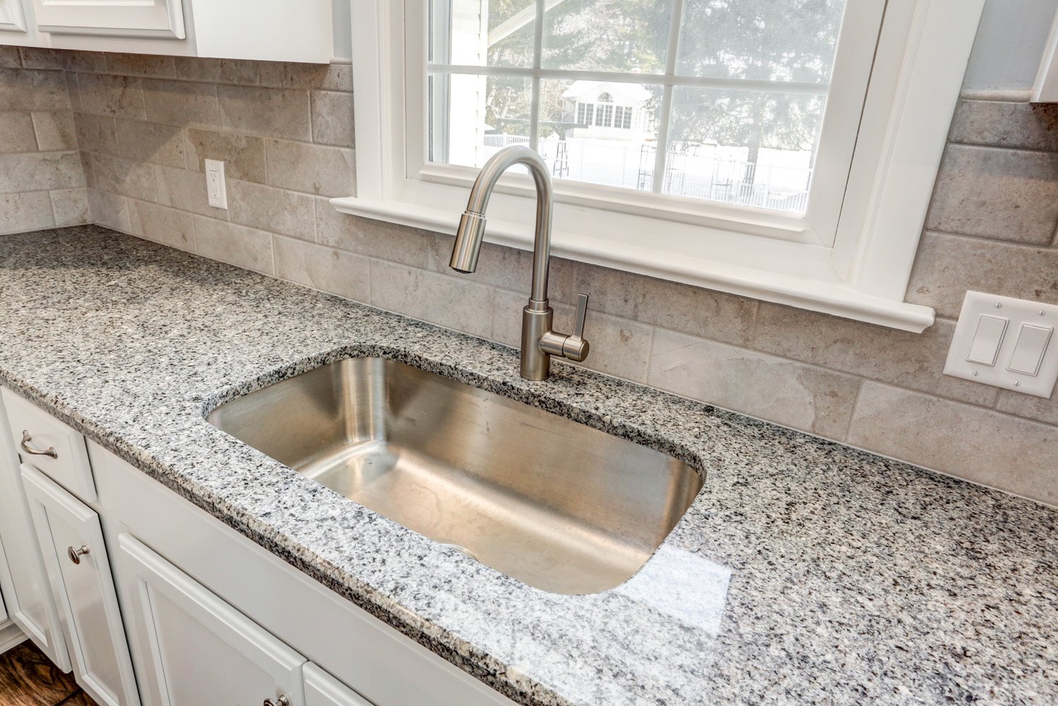 granite counter top and stainless steel faucet in Lititz Kitchen Remodel