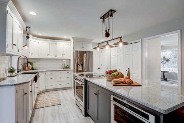 White cabinets and gray island in Lancaster kitchen remodel