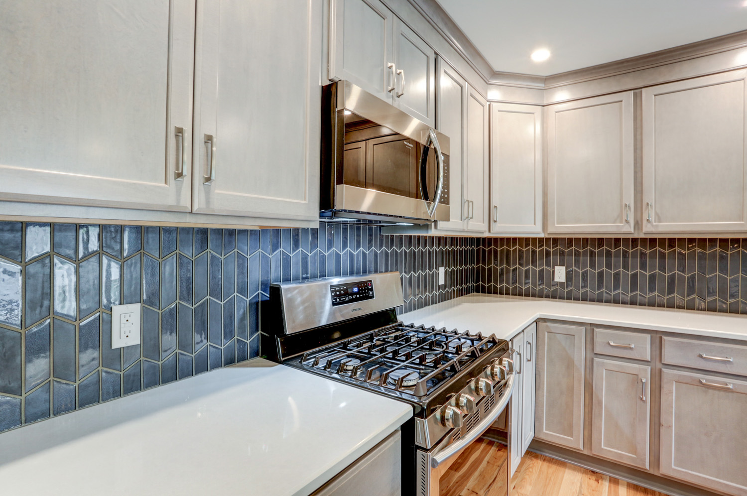 Rohrerstown Kitchen Remodel with steel grey cabinets and axis tile backsplash