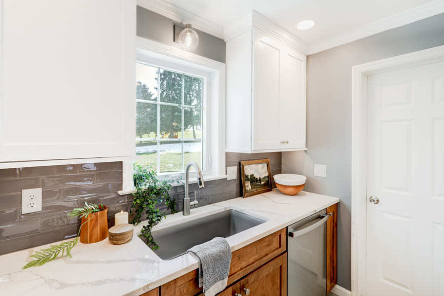 Lititz Kitchen Remodel with dual cabinets and gray backsplash