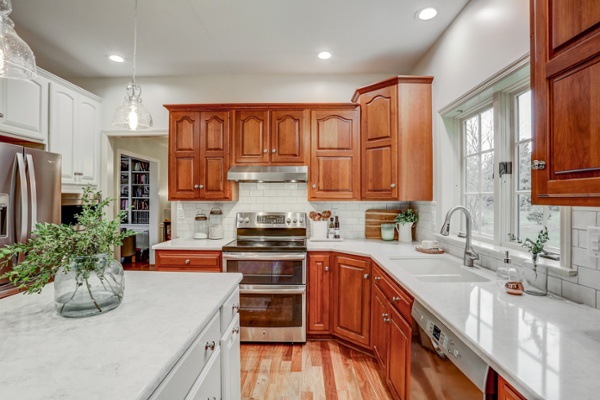 Kitchen remodel with traditional stained cabinets