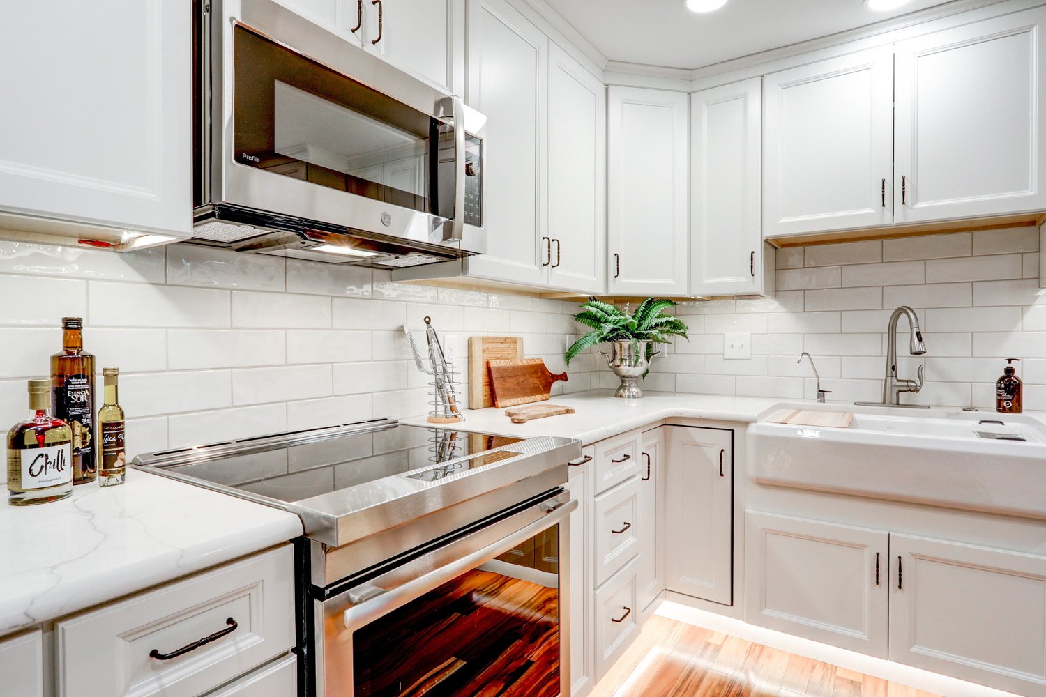 Leola Kitchen remodel with white cabinets and stainless steel appliances