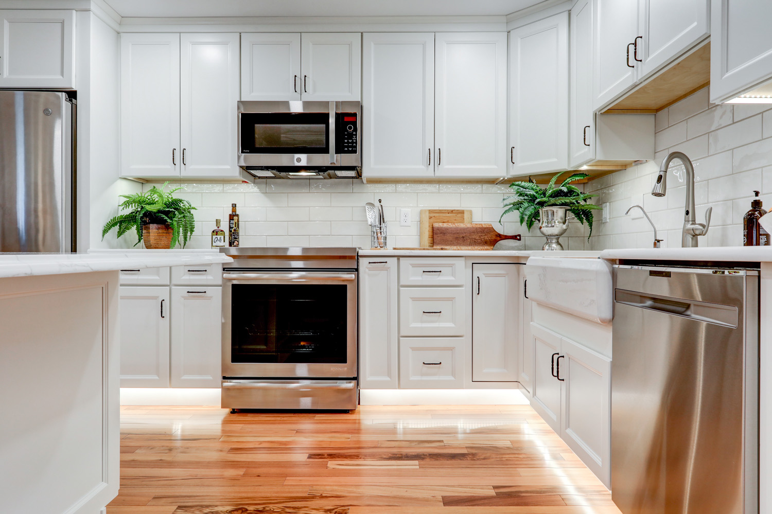 Leola Kitchen remodel with white cabinets and oil rubbed bronze hardware