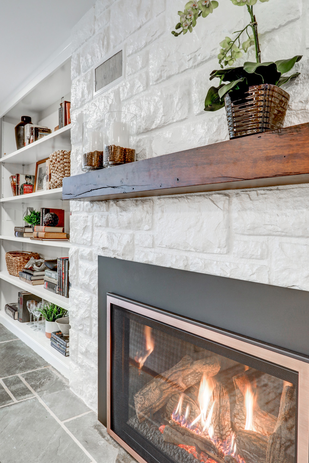 Custom wood mantel above fireplace in leola remodel