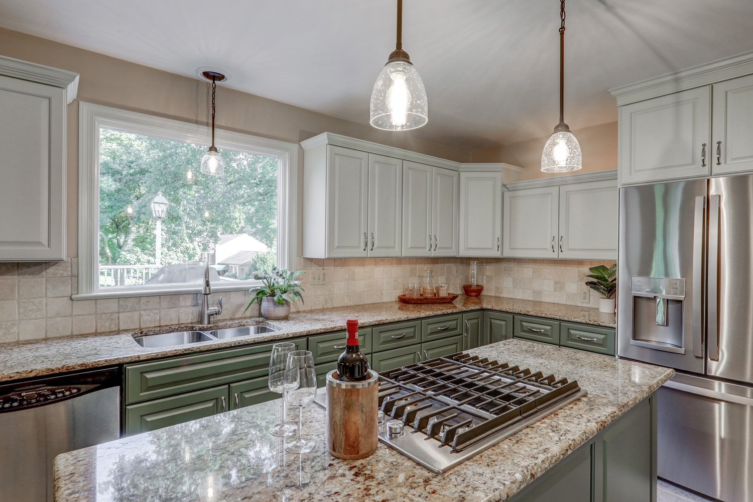 Lancaster kitchen facelift with green and white cabinets