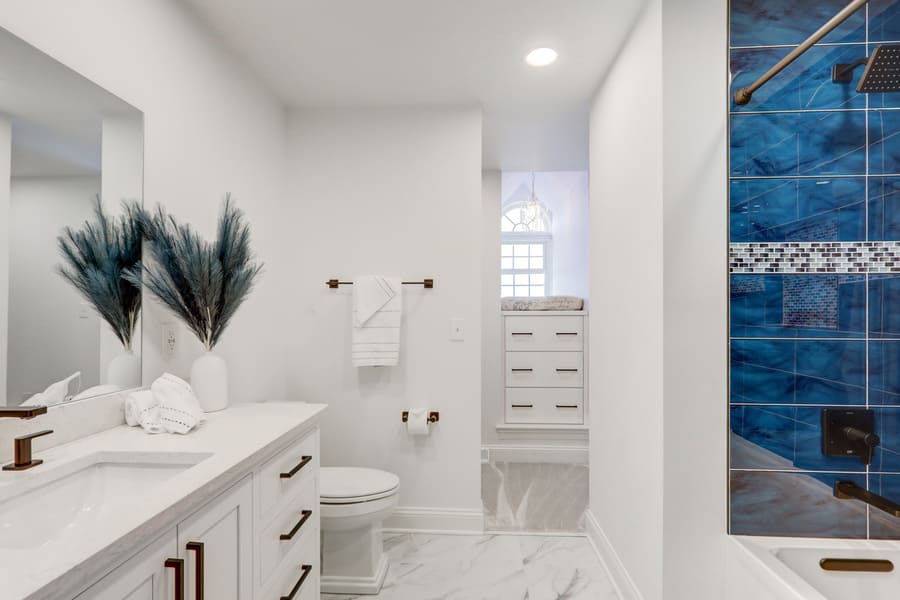 Manehim Bedroom remodel with bathroom with blue tile shower