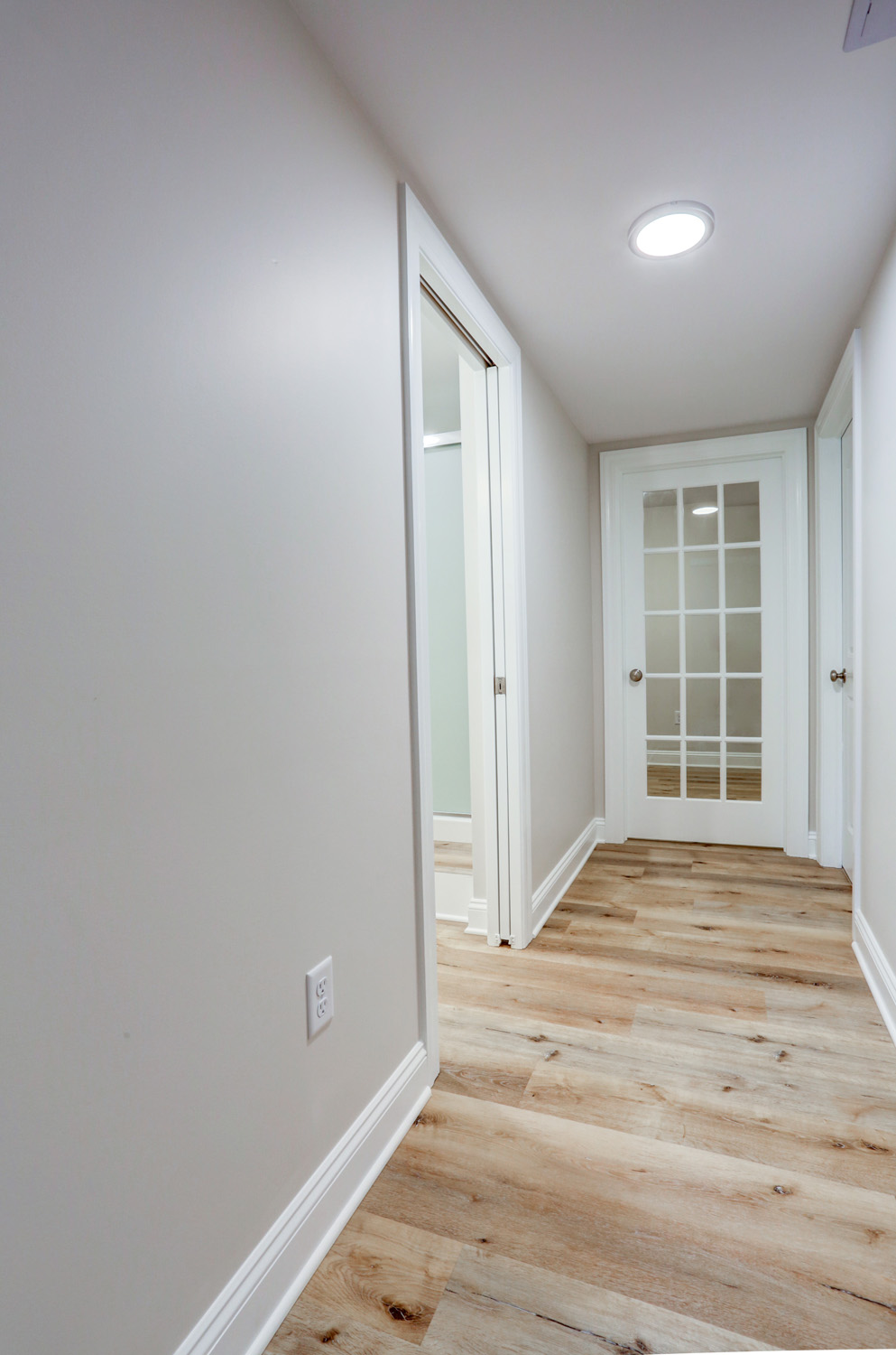 hallway with french door in Lancaster Basement Remodel