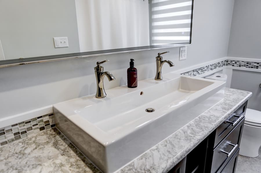 Vessel sink with double faucet in Roseville Master Bathroom Remodel