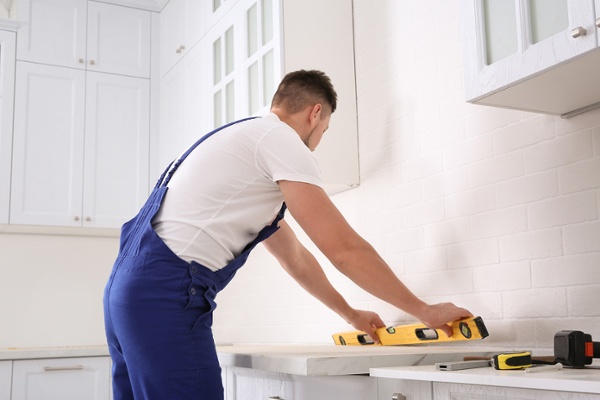 carpenter building a kitchen