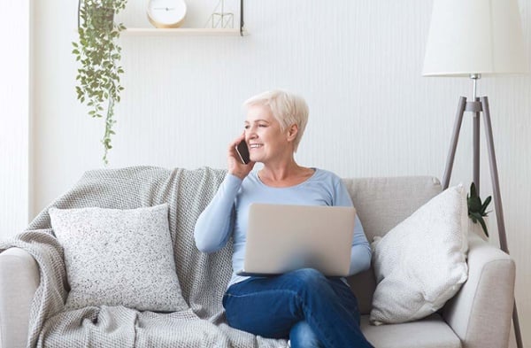 Woman on the phone during a remodeling consultation