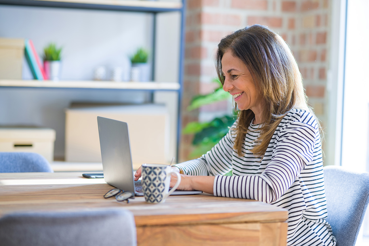 Woman typing on computer