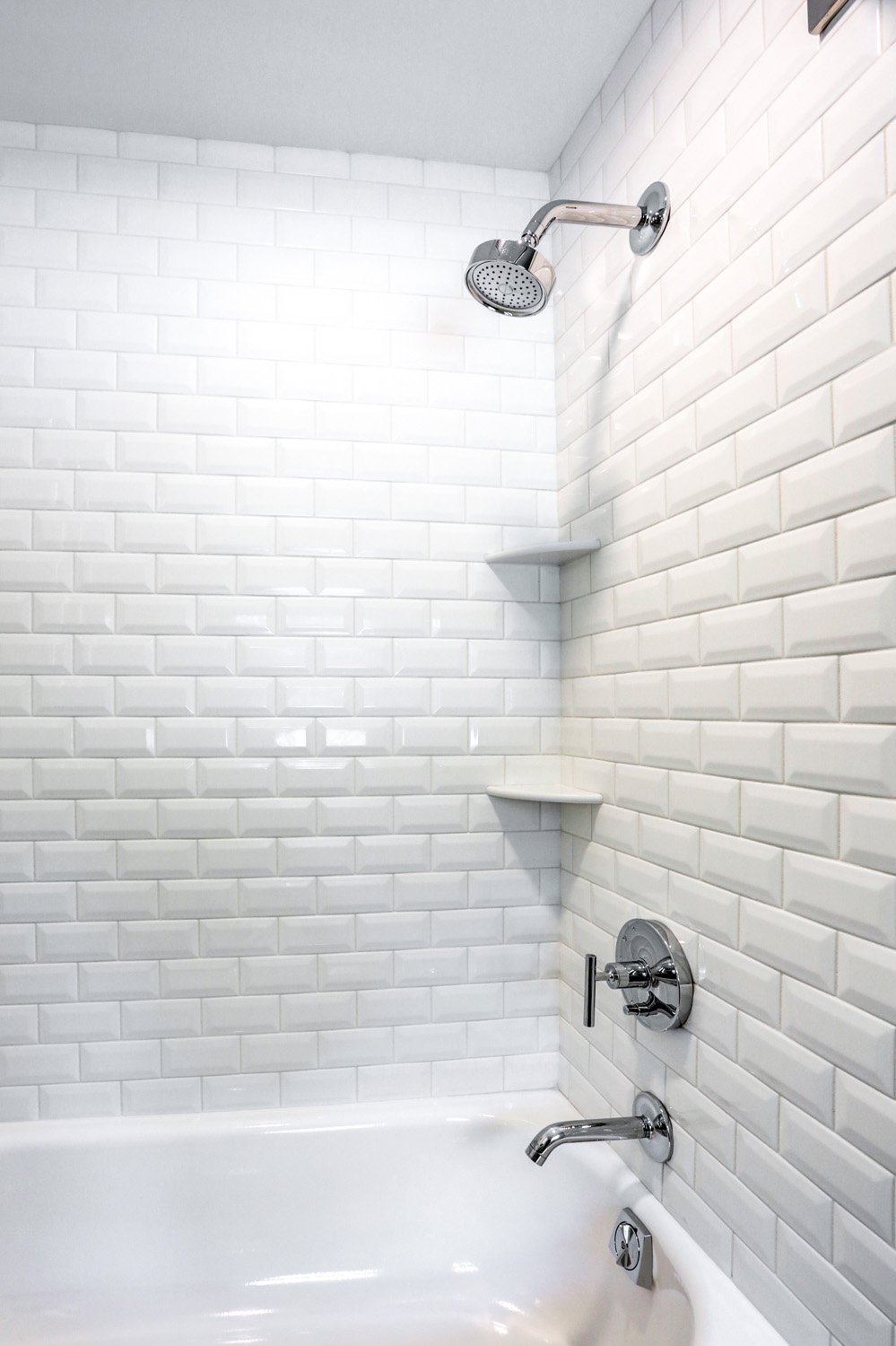 Tile walls in shower with chrome accessories in West Lancaster Bathroom Remodel