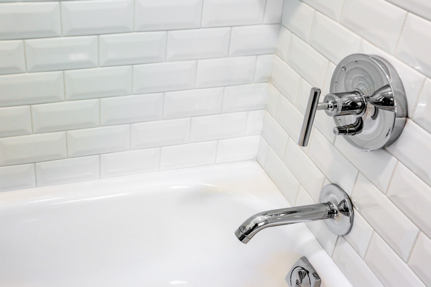 Porcelain finished steel bathtub with chrome accessories in West Lancaster Bathroom Remodel